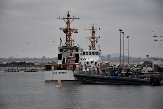 U.S. Coast Guard cutters moored at dock